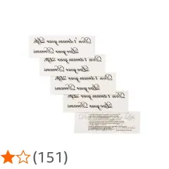 Mehrere Bögen mit der tatto schrift "Live your dreams" auf Englisch.