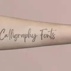 Ein Arm mit dem Schriftzug "Calligraphy Fonts" als feine Fineline-Tattoo.